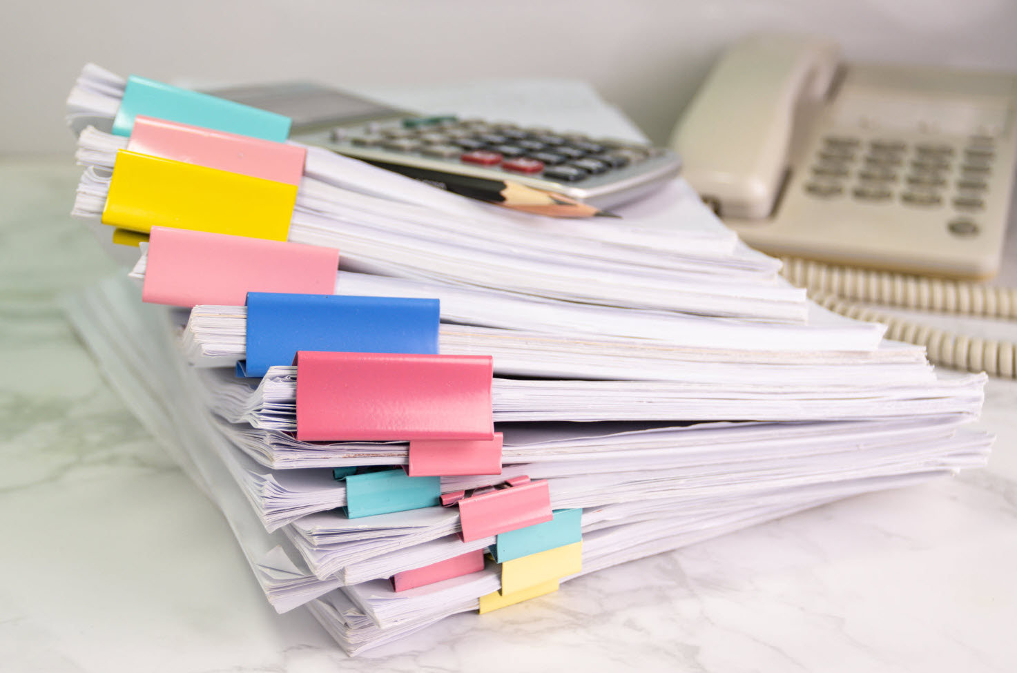 Organized business records and documents marked for review